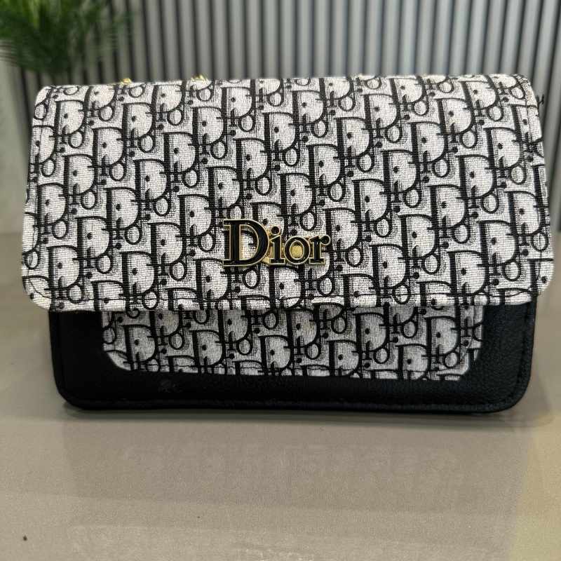 Dior handbag with black and white pattern on a light gray background