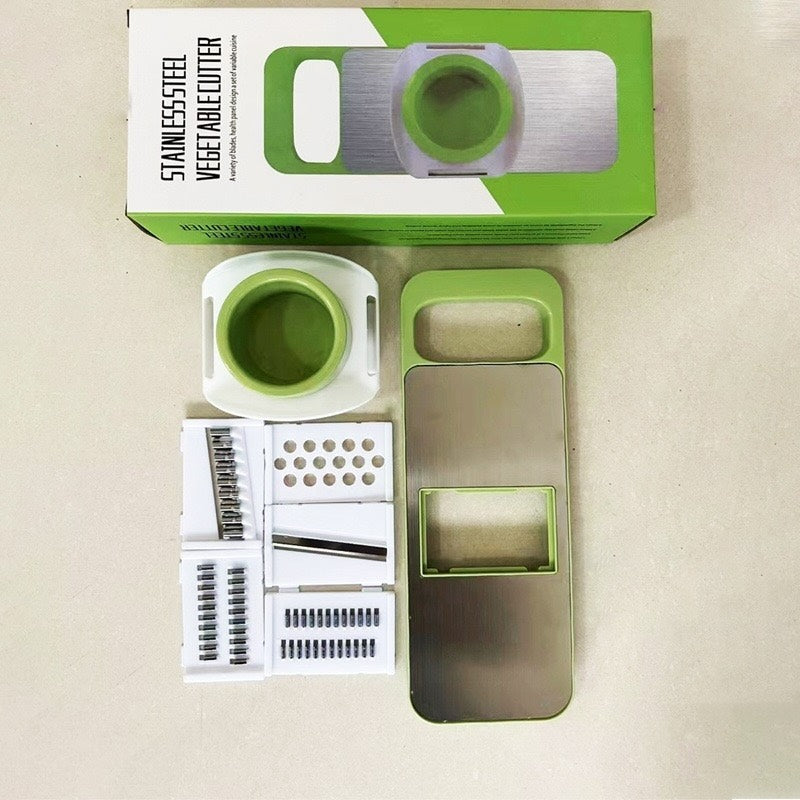 Vegetable cutter with packaging on a beige background